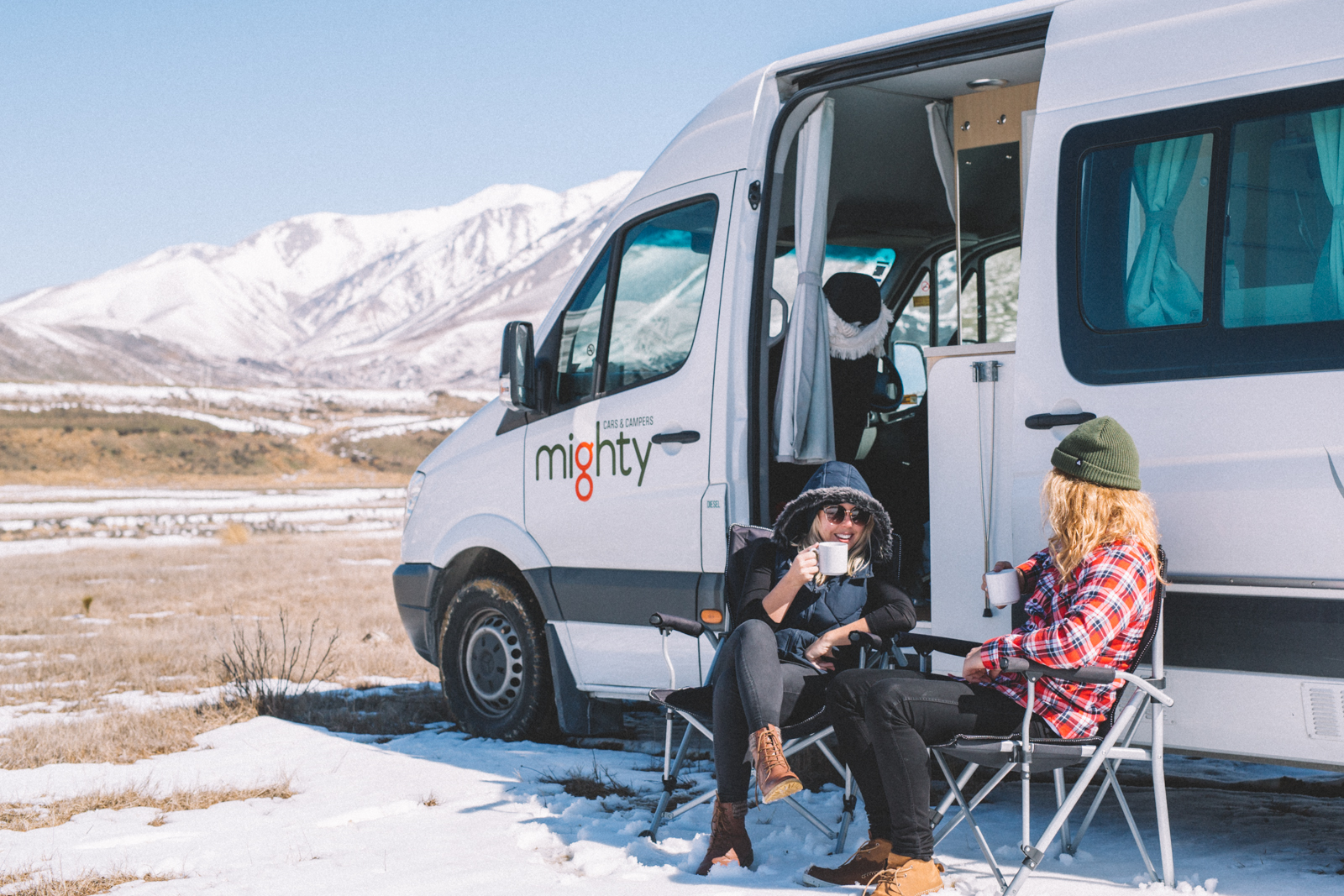 Winter road tripping through New Zealand in a campervan = pure magic. 🚐❄️ 
There’s nothing better than waking up to snowy mountains, a hot coffee in hand, and the comfort of your own warm little home on wheels.

Our tips for staying extra cozy:
– Park somewhere with a killer view (bonus if you catch sunrise over the mountains).
– Keep the van toasty with extra blankets, a hot water bottle, and some woolly socks.
– Don’t forget to crack a window at night to avoid condensation.
– Enjoy slow mornings with porridge or pancakes and evenings snuggled up with a movie or board game.

And make time to actually get out in the snow. Winter in NZ isn’t just beautiful, it’s an adventure. 🏔️✨

#CampervanLife #WinterInNZ #CozyOnWheels